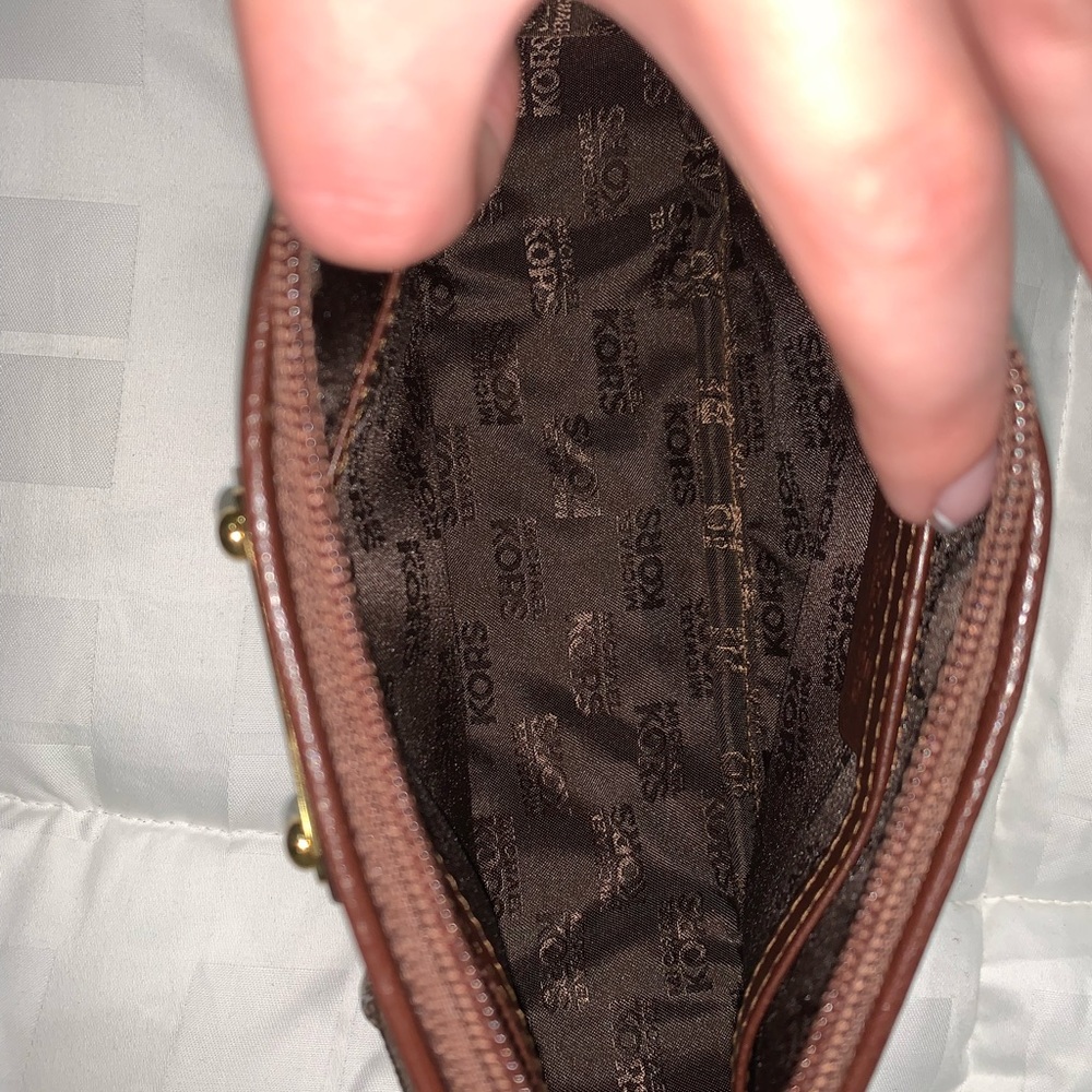 Michael Kors cosmetic bag with compartments inside